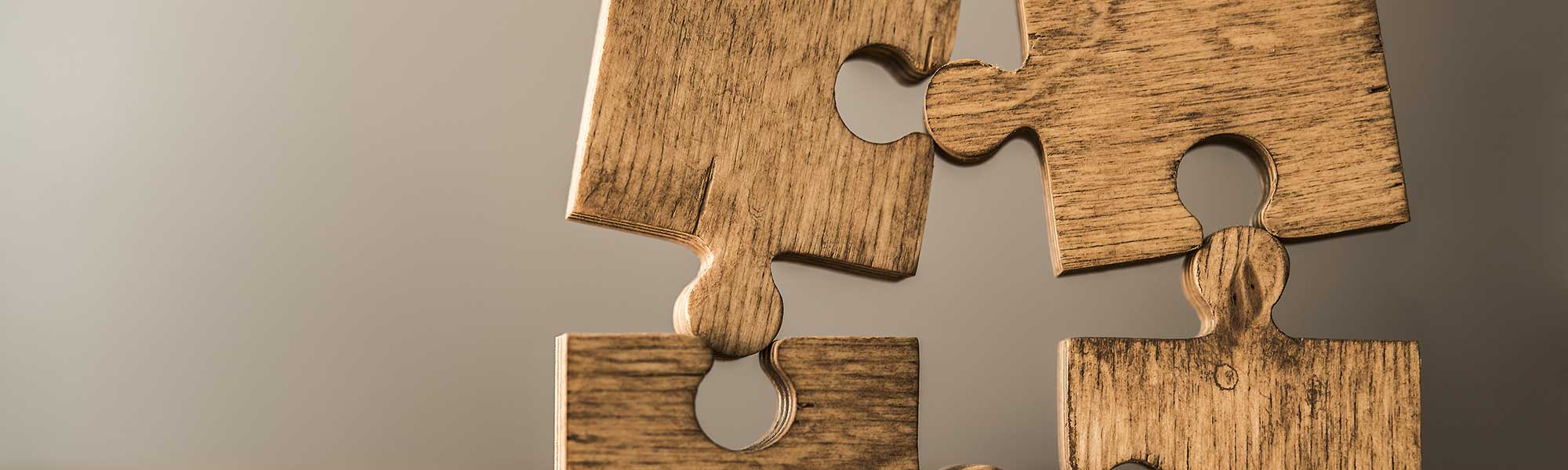 Wooden pieces of a jigsaw puzzle