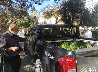 A van loaded with plants