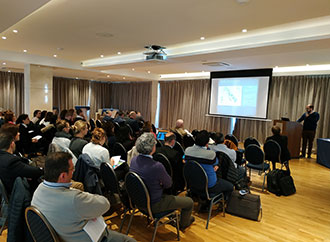 Audience listening to speaker at seminar