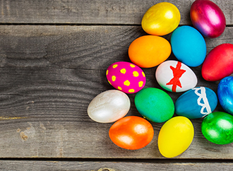 Easter eggs on wooden background