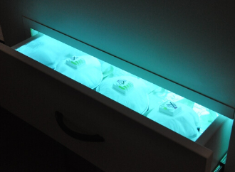 Disinfecting face respirators