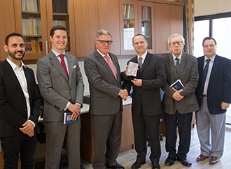 HE, Spanish Ambassador Don José Pons presents work by Cervantes to the Department of Maltese
