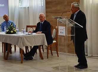 Rev. Prof. Emmanuel Agius delivers presentation at Bioethics Symposium