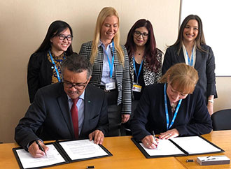 Dr Tedros Adhanom, Director General WHO and Dr Catherine Duggan, CEO of FIP with (l to r) Sherly Meilianti, Young Pharmacists Group, Zuzana Kusynova, FIP, Professor Lilian M. Azzopardi and Lina Bader, FIP.