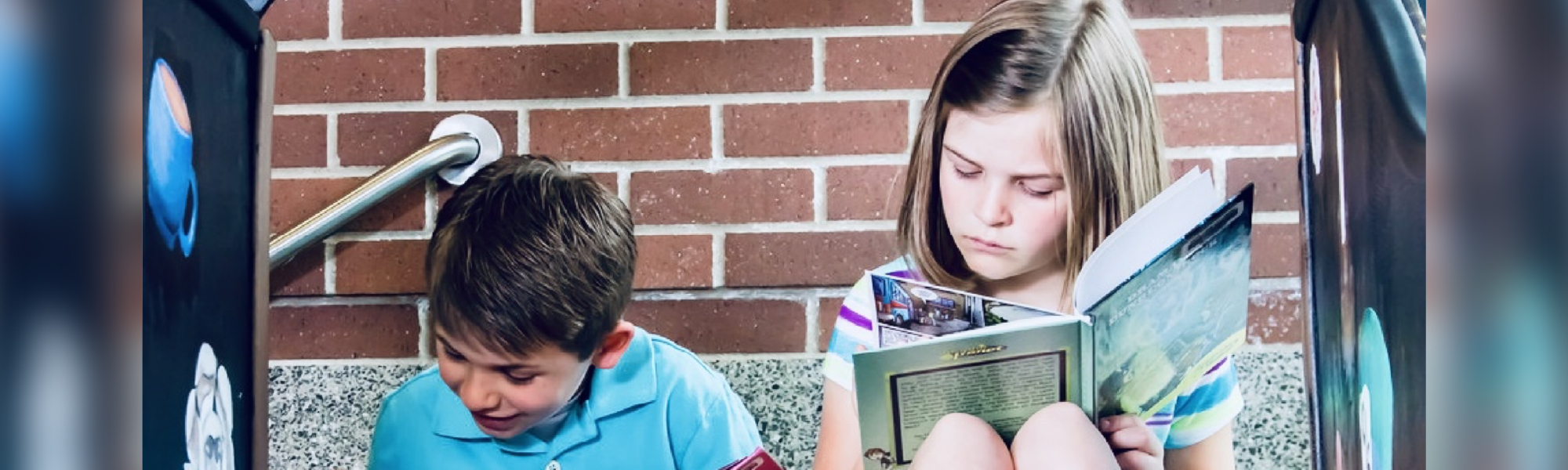 Two children reading