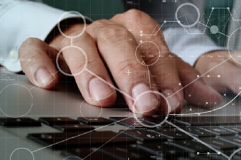 Person typing with keyboard