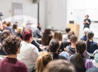 Audience listening to speaker