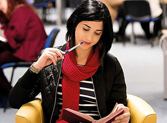 Student in library