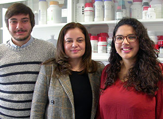 Gabrielle Zammit with two students