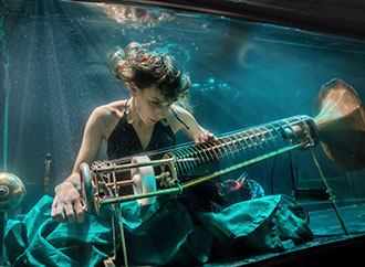 Playing an instrument underwater