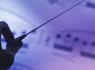 Hand, baton and music score
