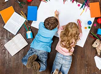 Two children drawing