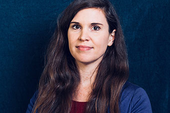 Conference session in progress - speakers and audience