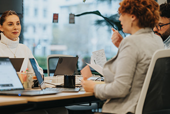 Three people in an office