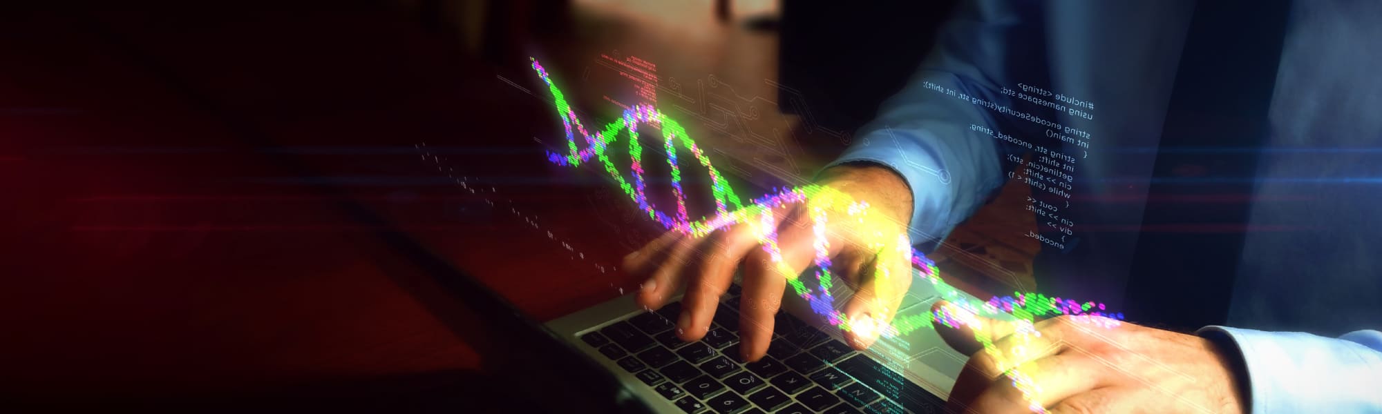 A detail of a person typing on a laptop