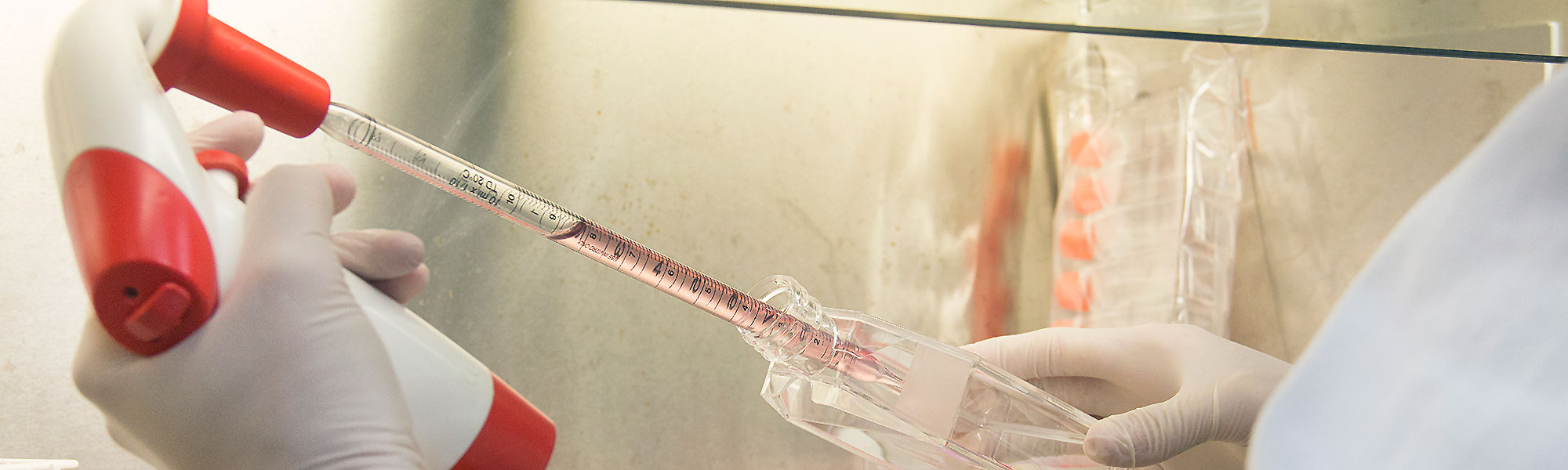 Extracting a liquid using a large pipette