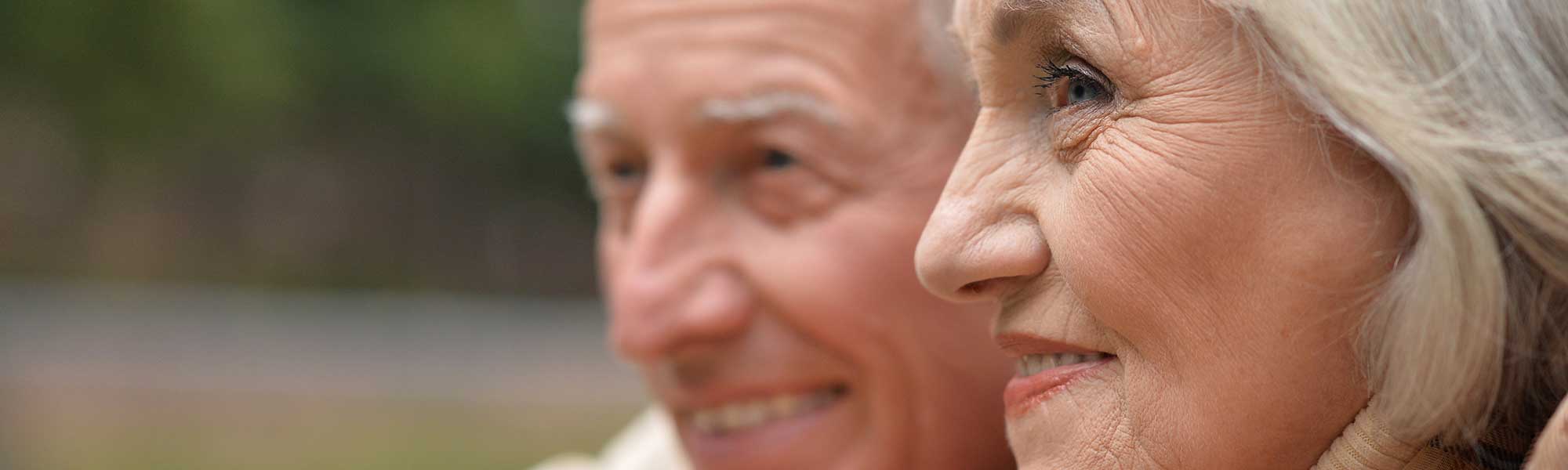 A close-up photo of two elderly people