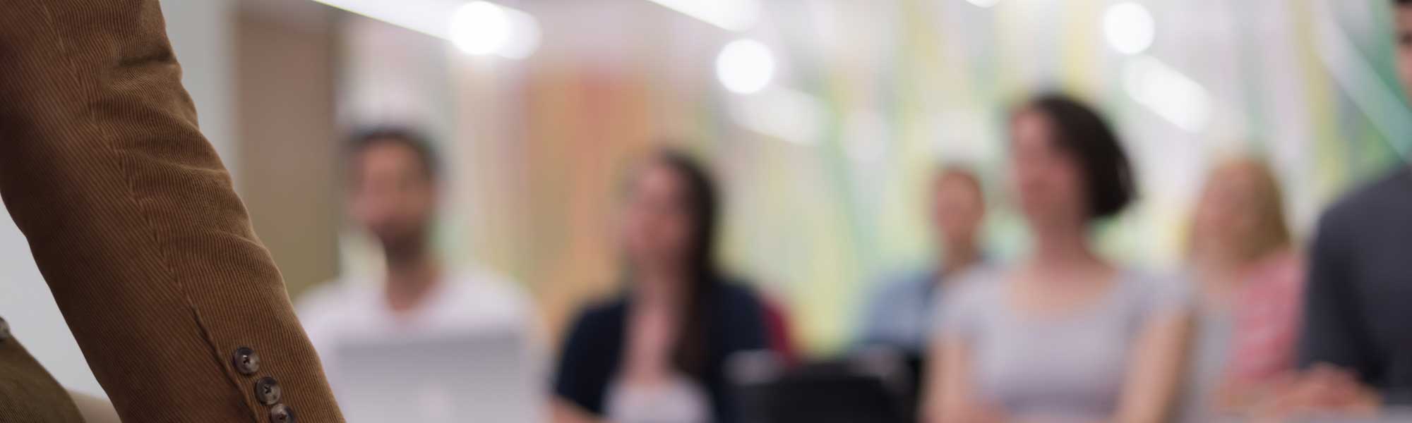Professor giving lecture to students