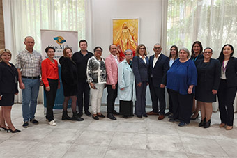 A group photo - people standing in a group facing the camera