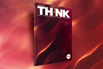 THINK magazine front cover and two-page spread on a red background