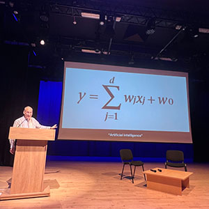 Academic speaking on a stage