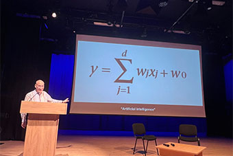 Academic speaking on a stage