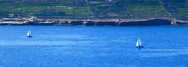 The Maltese landscape, the sea and boats