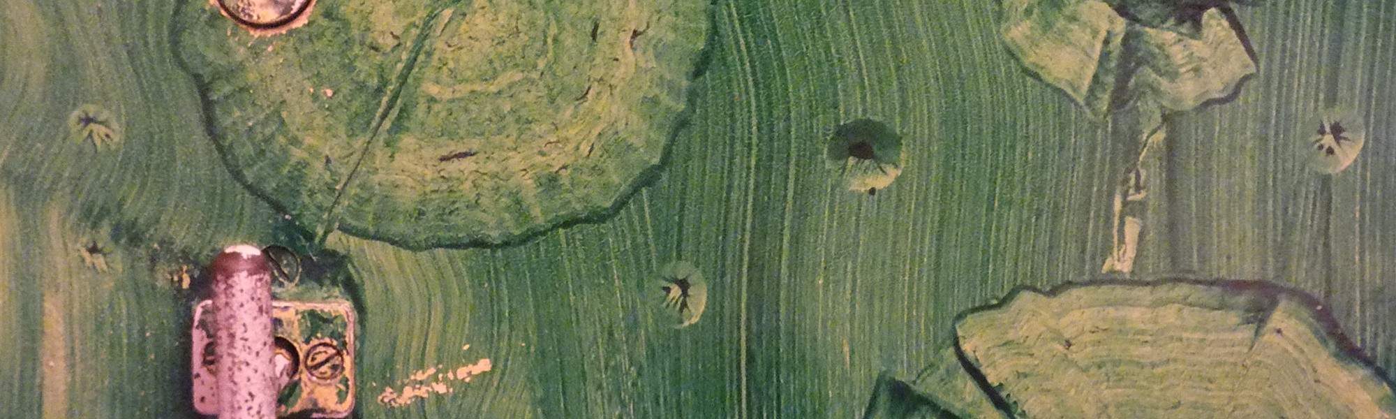 Wood texture in green and some metal fixtures