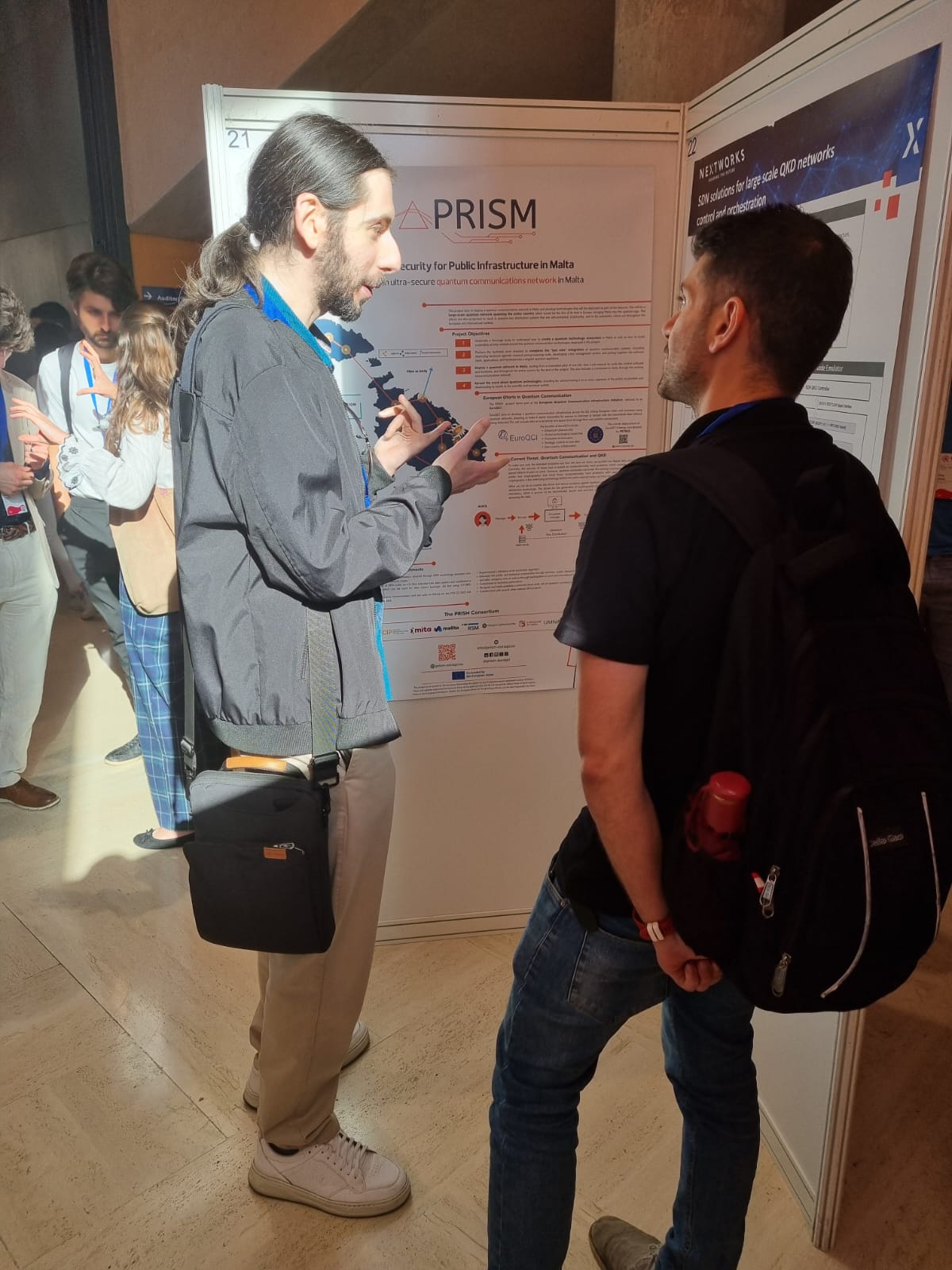 Dr Ing. Christian Galea explaining the PRISM project to an attendee