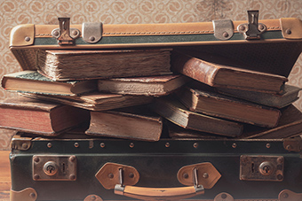 An old suitcase with old books